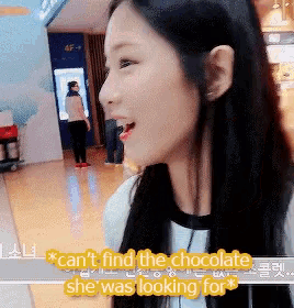 a woman is smiling with the words " can 't find the chocolate she was looking for " below her