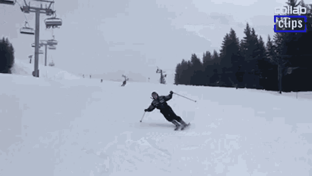a person is skiing down a snow covered slope with a collab clip in the upper right corner