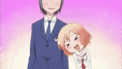 a man in a suit and tie is standing next to a girl in a school uniform