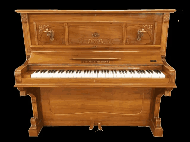 a piano made by steinway & sons with a black background