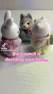 three stuffed animals are sitting next to each other on a table with the caption the council is deciding your fate .