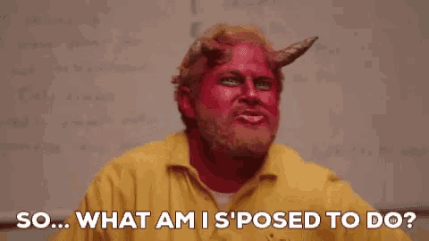 a man with red paint on his face and horns is asking what am i 'm ' posed to do .