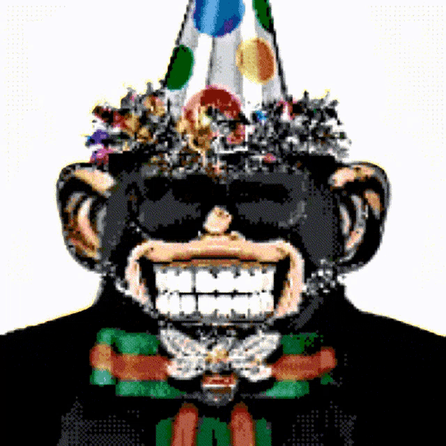 a monkey wearing a party hat and sunglasses