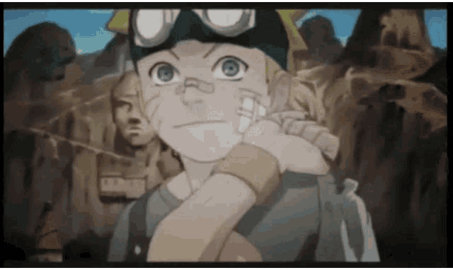 a young boy with a bandage on his face is standing in front of a mountain