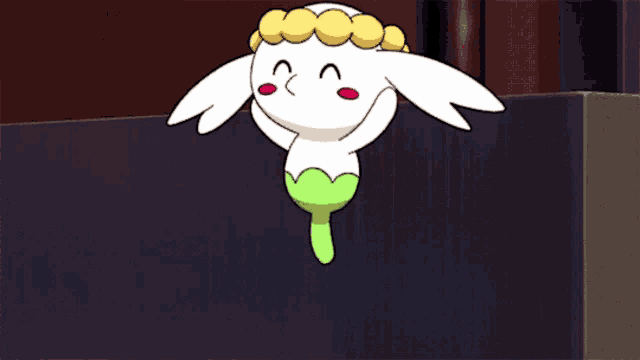 a cartoon character with wings and a wreath around its head