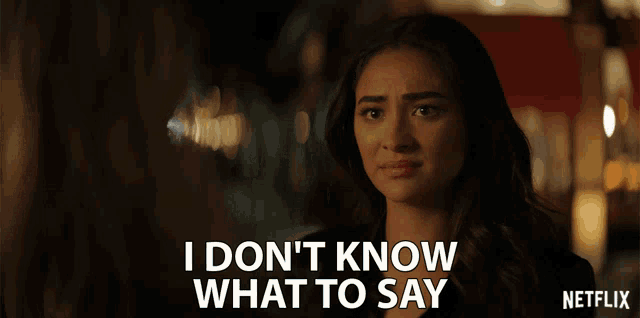 a woman says " i don 't know what to say " in front of a netflix logo