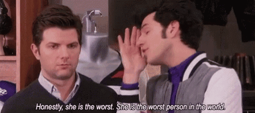 two men are talking to each other and one of them is saying `` honestly , she is the worst . ``