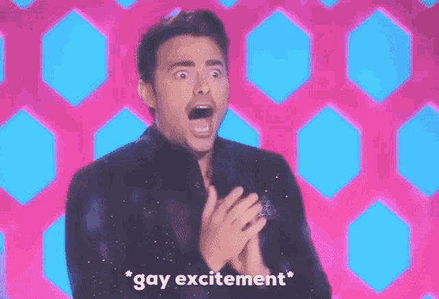 a man is making a surprised face and says gay excitement .