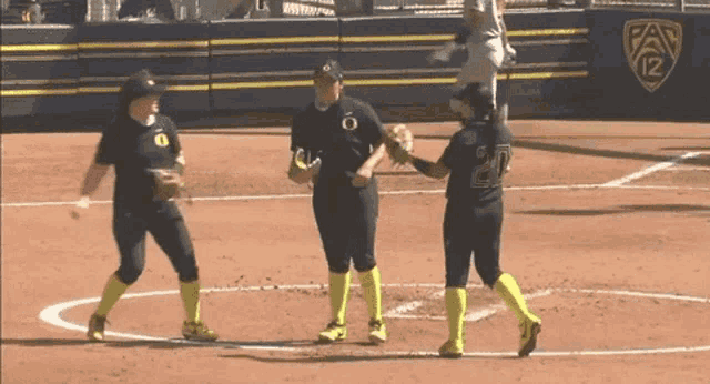 a softball player with the number 20 on the back of her shirt