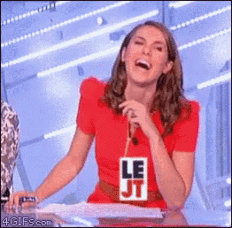 a woman wearing a red shirt that says le jj