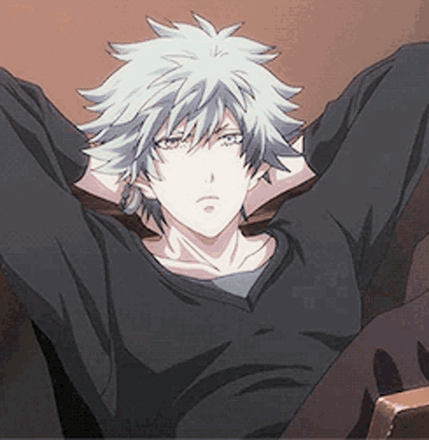 a boy with gray hair and purple eyes is laying down with his arms behind his head