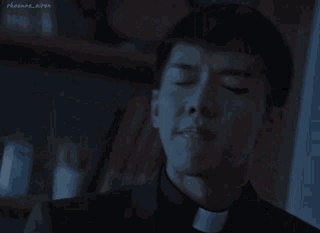 a man in a priest 's collar holds a bottle and says you 're stressing me out