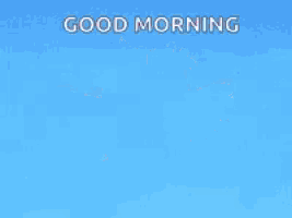 a cartoon owl is flying in the sky with the words `` good morning '' written on it .