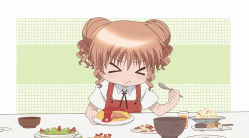 a girl is sitting at a table with a plate of food