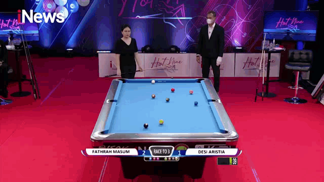 a pool table with a score of 1 to 2 on it