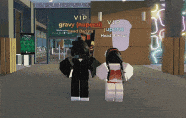 a couple of people are standing in front of a sign that says gravy