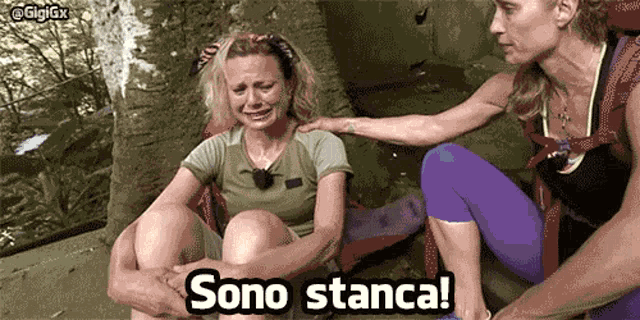 two women are sitting next to each other and one of them is crying with sono stance written on the bottom