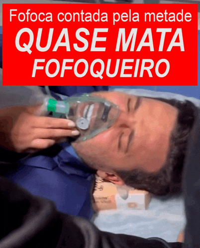 a man wearing an oxygen mask is laying on a bed