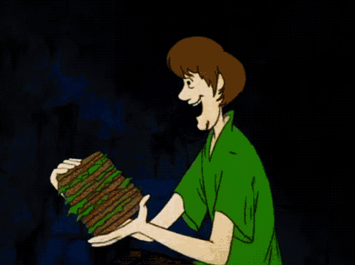 a cartoon character is eating a hamburger with his mouth open