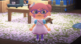 a girl wearing glasses and a pink dress is standing in a video game