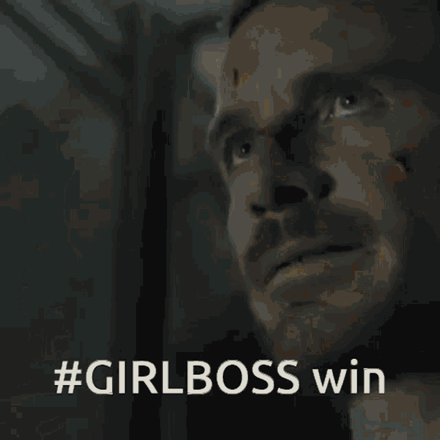a woman holding a gun with the words #girlboss win written on it