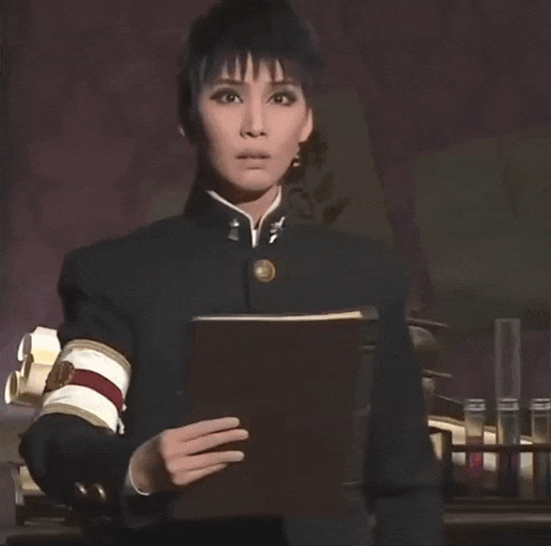 a man in a black uniform is holding a piece of paper