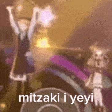 a blurry picture of a person with the words mitzaki i yeyi