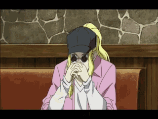 a person wearing sunglasses and a hat is sitting on a bench