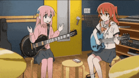 two anime girls are playing guitars in a room with the number 46 on the wall