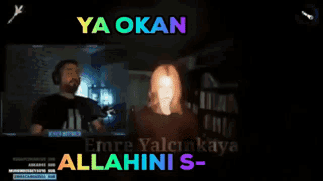 a man and a woman are standing in front of a screen that says ' ya okan '