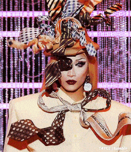a woman is wearing a hat and a scarf around her neck and the word tumblr is on the bottom