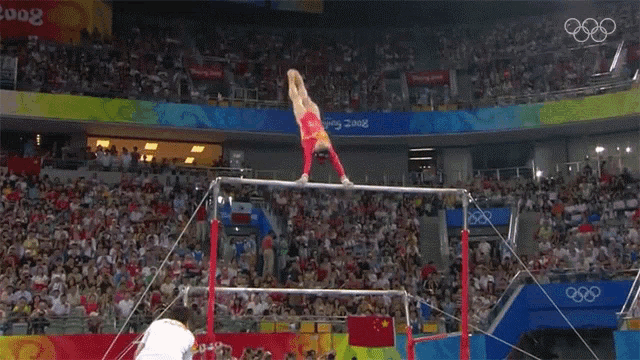 Uneven Bars He Kexin GIF - Uneven Bars He Kexin International Olympic Committee250days GIFs