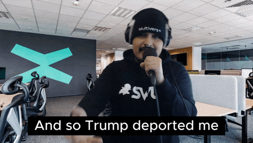 a man singing into a microphone with the words and so trump deported me above him