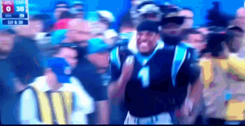 a blurry picture of a crowd of people with a scoreboard that says 0 36