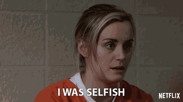 a woman in an orange jumpsuit says i was selfish on netflix