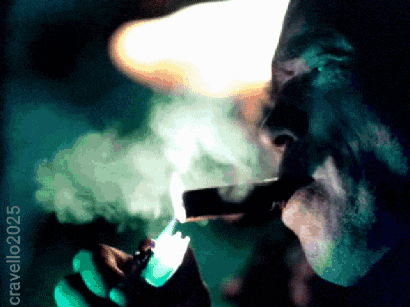 a man is lighting a cigar with a lighter and smoke is coming from his mouth
