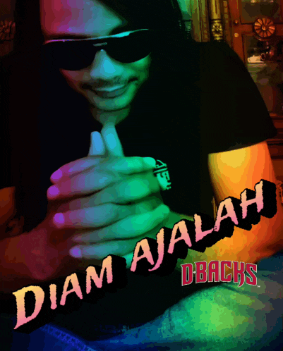 a man wearing sunglasses and a black shirt that says diam ajalah
