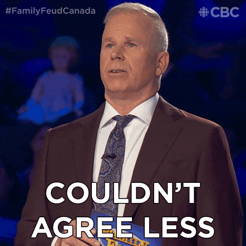 a man in a suit and tie is saying couldn 't agree less