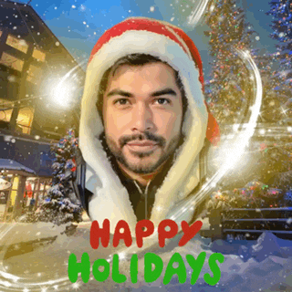 a man wearing a santa hat with the words happy holidays in green