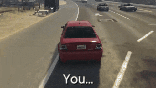 a red car is driving down a highway with the words " you " written below it