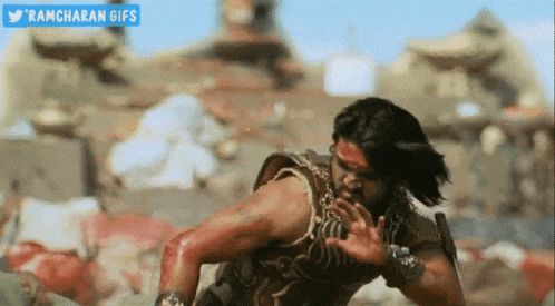 a ramcharan gif is displayed above a man in a warrior costume