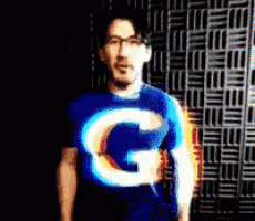 a pixelated image of a man wearing a shirt with the letter g on it