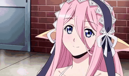 a girl with long pink hair and blue eyes is sitting in front of a brick wall and smiling .