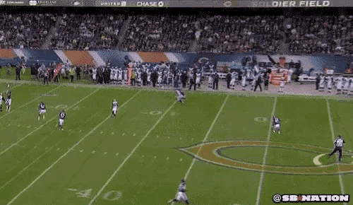 a football game is being played on a field with the number 40 on the field
