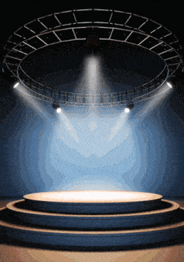 an empty stage with a circle of lights shining on it