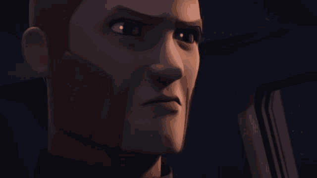a close up of a man 's face with an angry look on his face