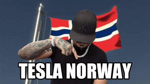 a man wearing a ny hat stands in front of a norway flag