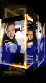 a picture of a woman with a bow and arrow in a cube with the letter n on it