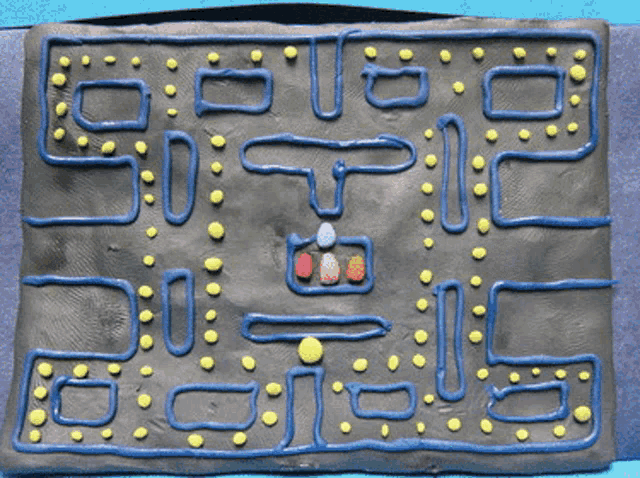 a piece of clay has a pac man pattern on it