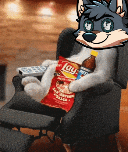 a furry character is sitting in a chair holding a bag of lay chips